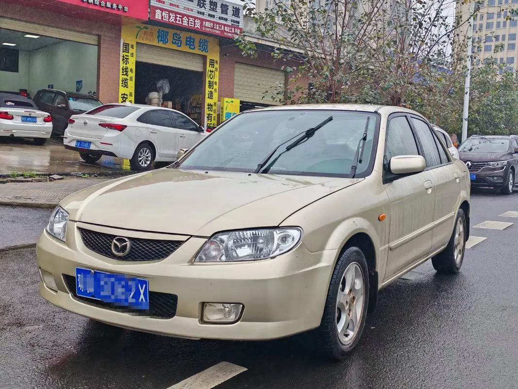 最老款马自达323的图片,最老的那款马自达323叫什么